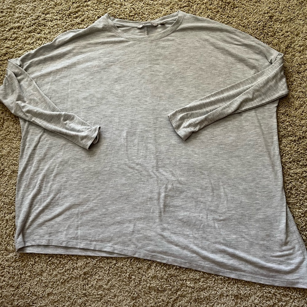 Athleta asymmetrical long sleeve. Great condition.